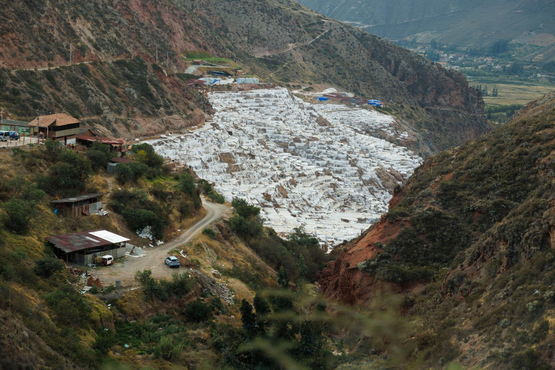 Salineras de Maras, the Maras salt mines, are mined by families who have owned the ponds for generations in the Sacred Valley, near Cusco, Peru, in August. (AP Photo/Alie Skowronski)