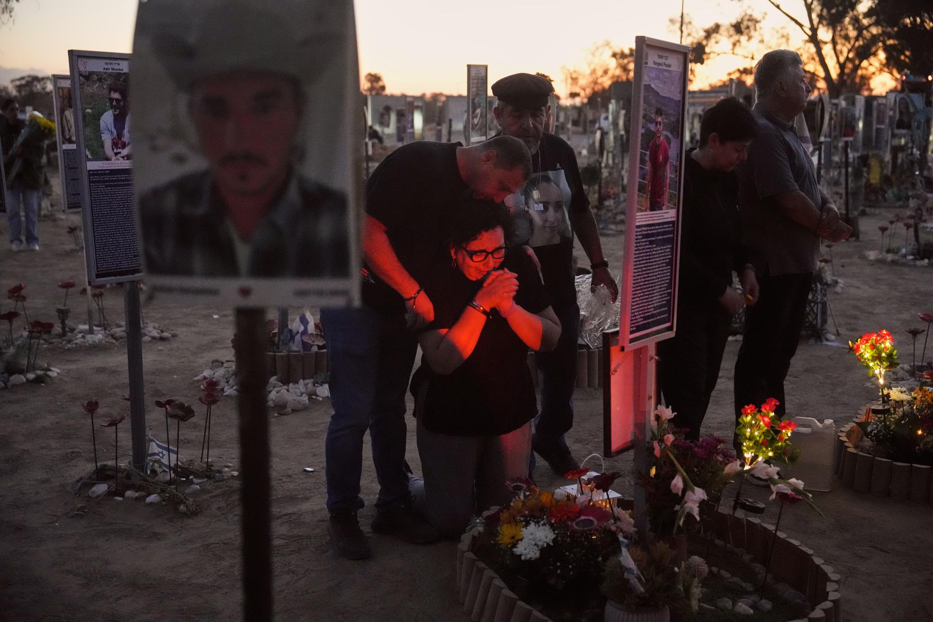 People visit the site of the Nova music festival as Israel marks the second anniversary of the attack, near Kibbutz Reim, southern Israel, on Tuesday.