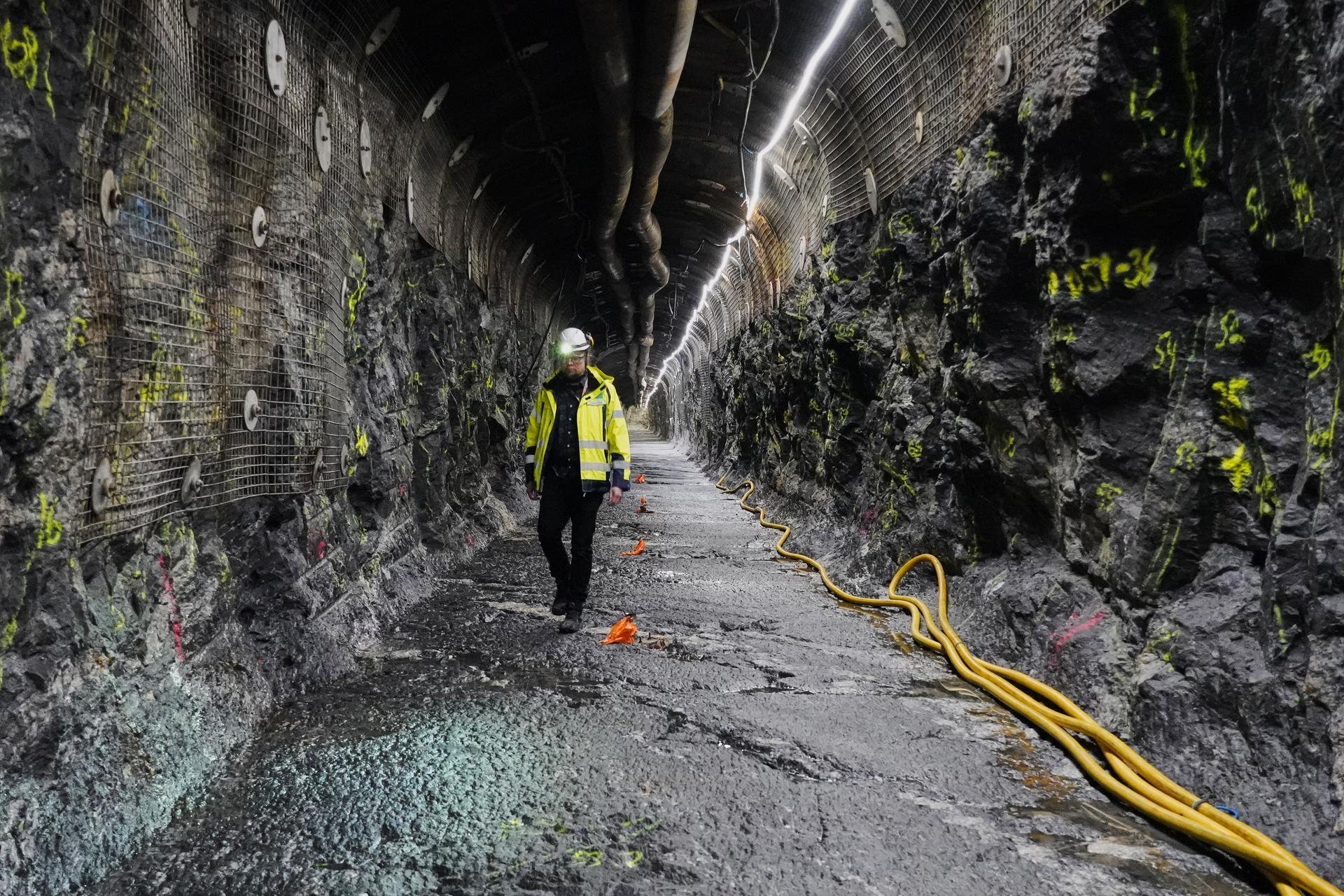 Geologist Tuomas Pere walks down a disposal tunnel inside the Posiva Onkalo nuclear waste repository on the island of Olkiluoto, Finland, Feb. 24.