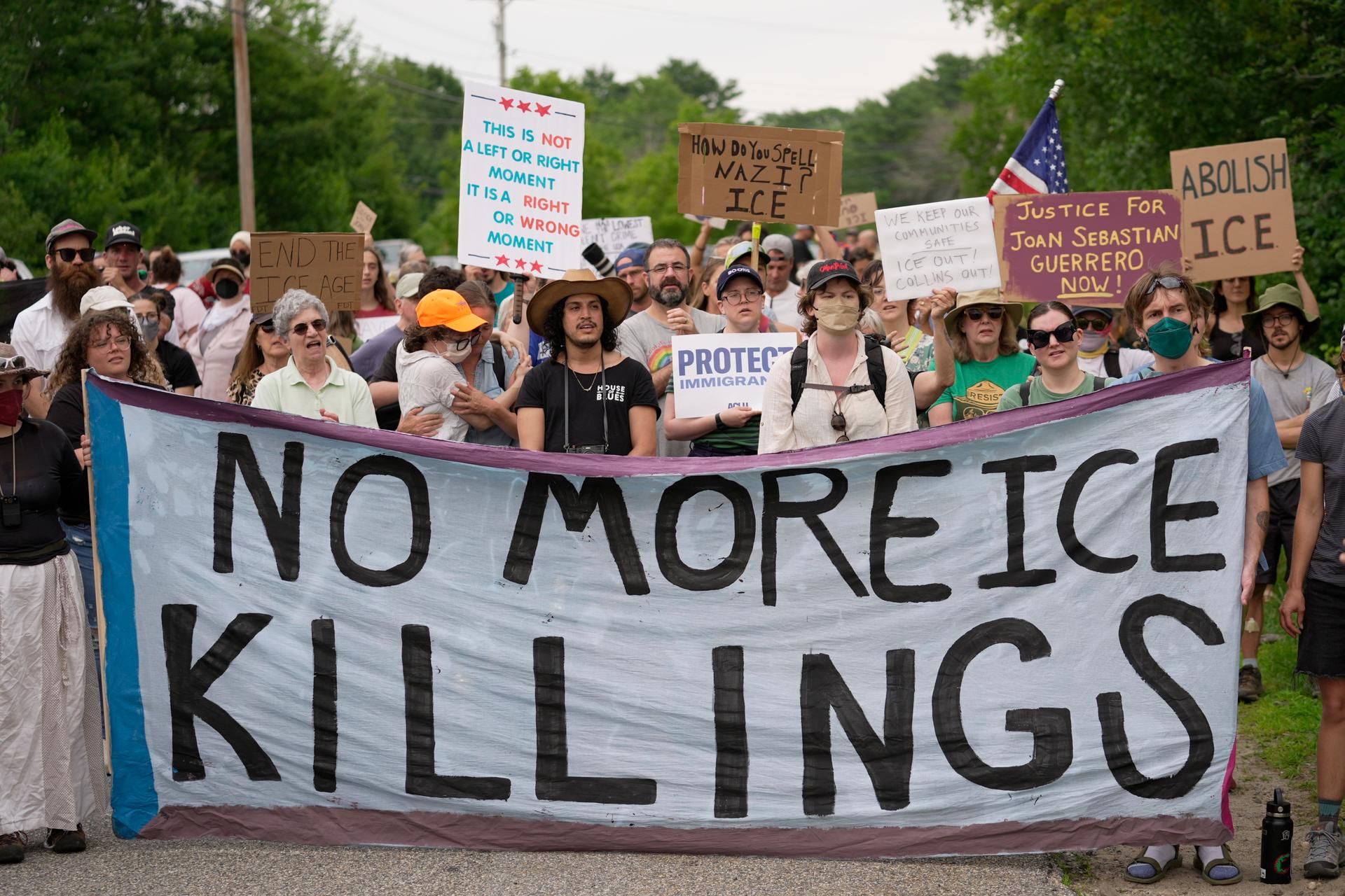 Protesters gather near an ICE facility in Scarborough, Maine, Tuesday.