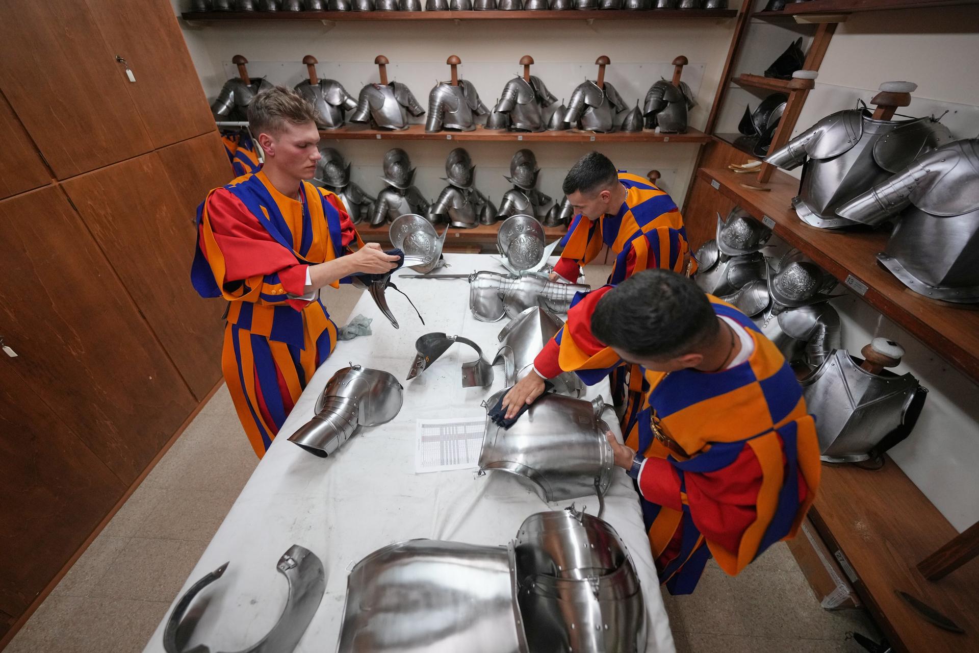 Pontifical Swiss Guards prepare ahead of their swearing in ceremony at the Vatican on Saturday. (AP Photo/Andrew Medichini)