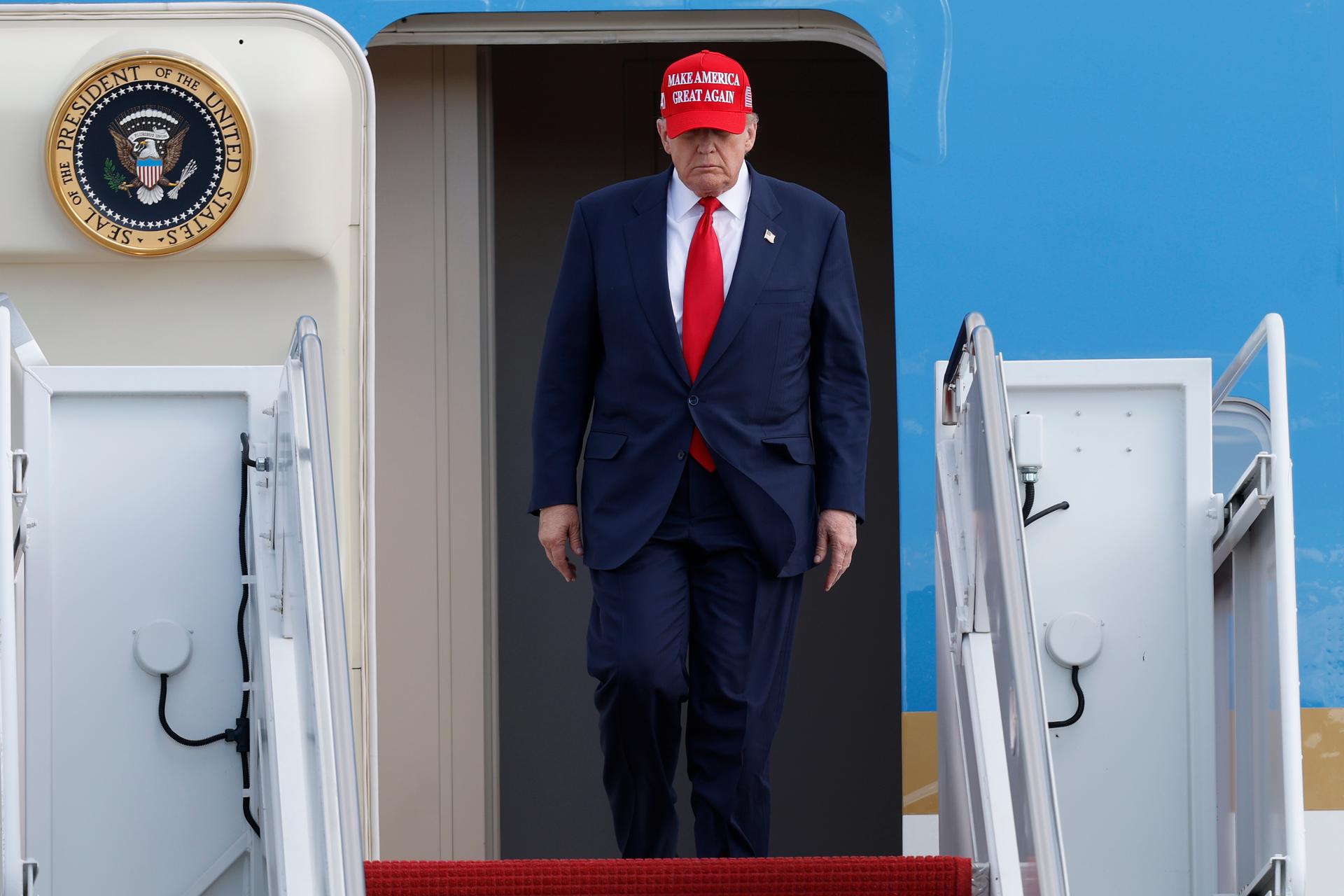 President Donald Trump walks down the stairs of Air Force One upon his arrival at Joint Base Andrews, Md., Thursday.
