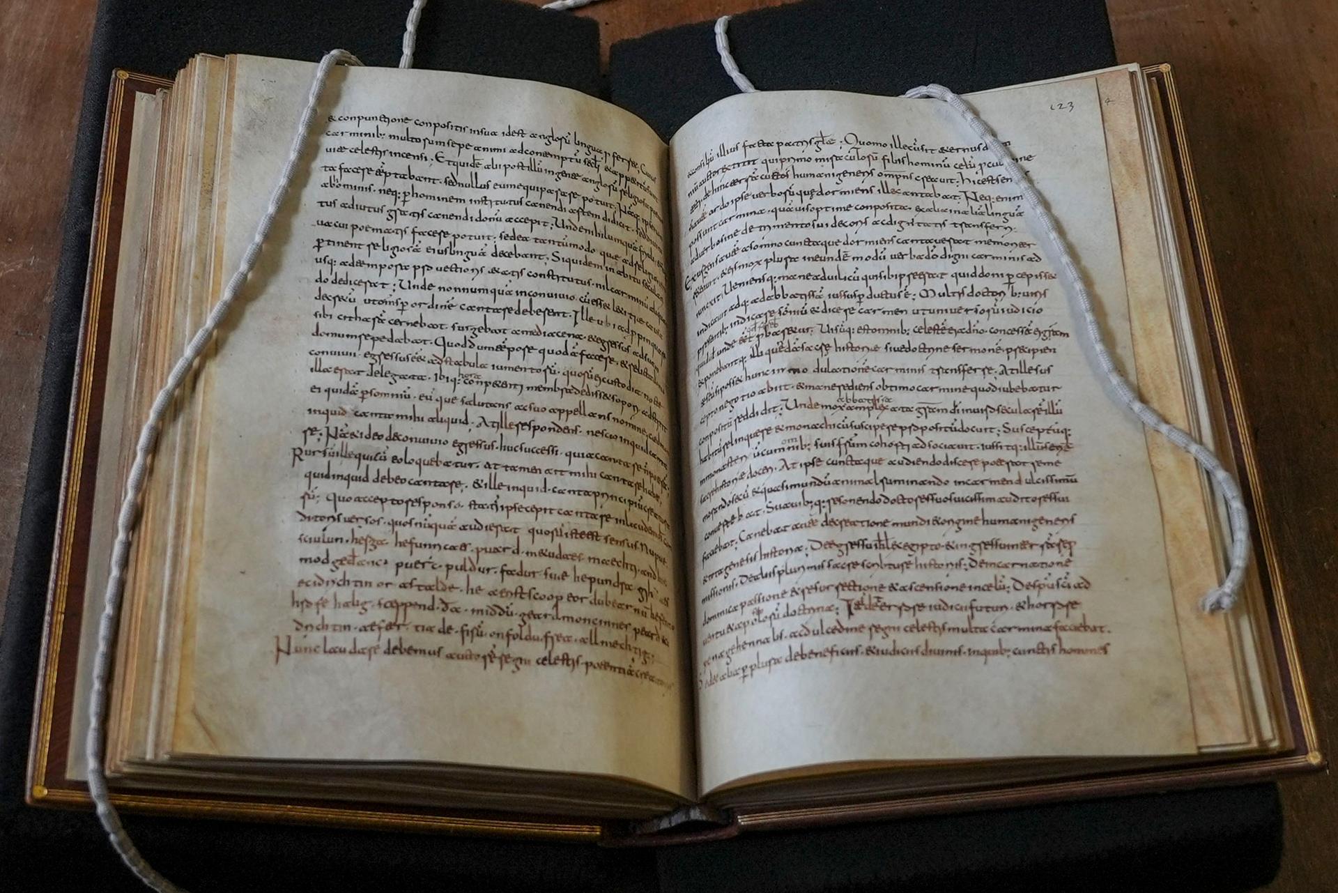 Caedmon’s Hymn is visible in the five lines above the final line of the left page from a centuries-old manuscript copy of the Venerable Bede’s Ecclesiastical History of the English People, at Rome’s National Library, May 8.