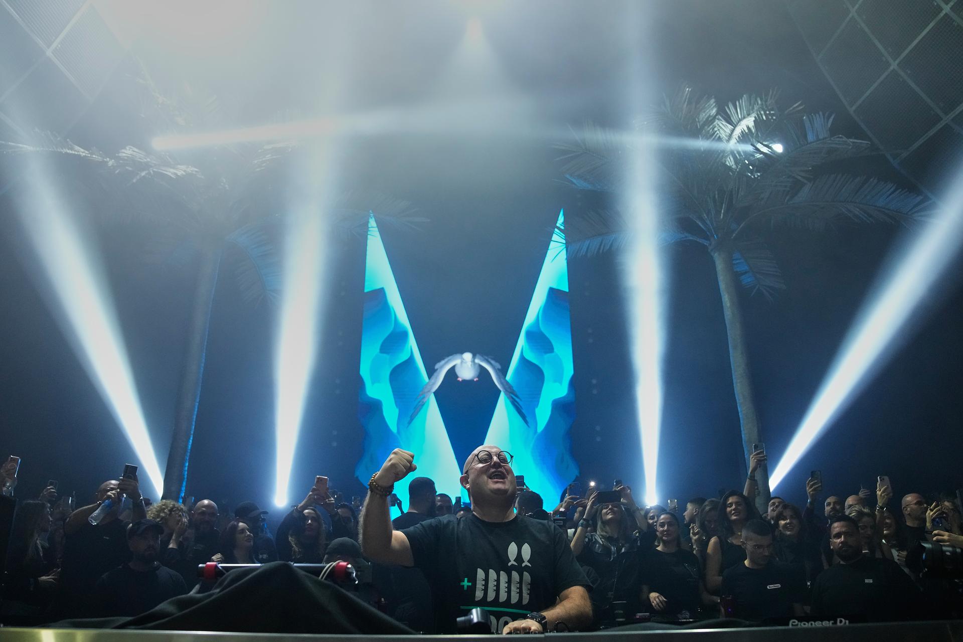 Portuguese Catholic priest and DJ Guilherme Peixoto, performs during a concert in Beirut, Lebanon, Sunday.