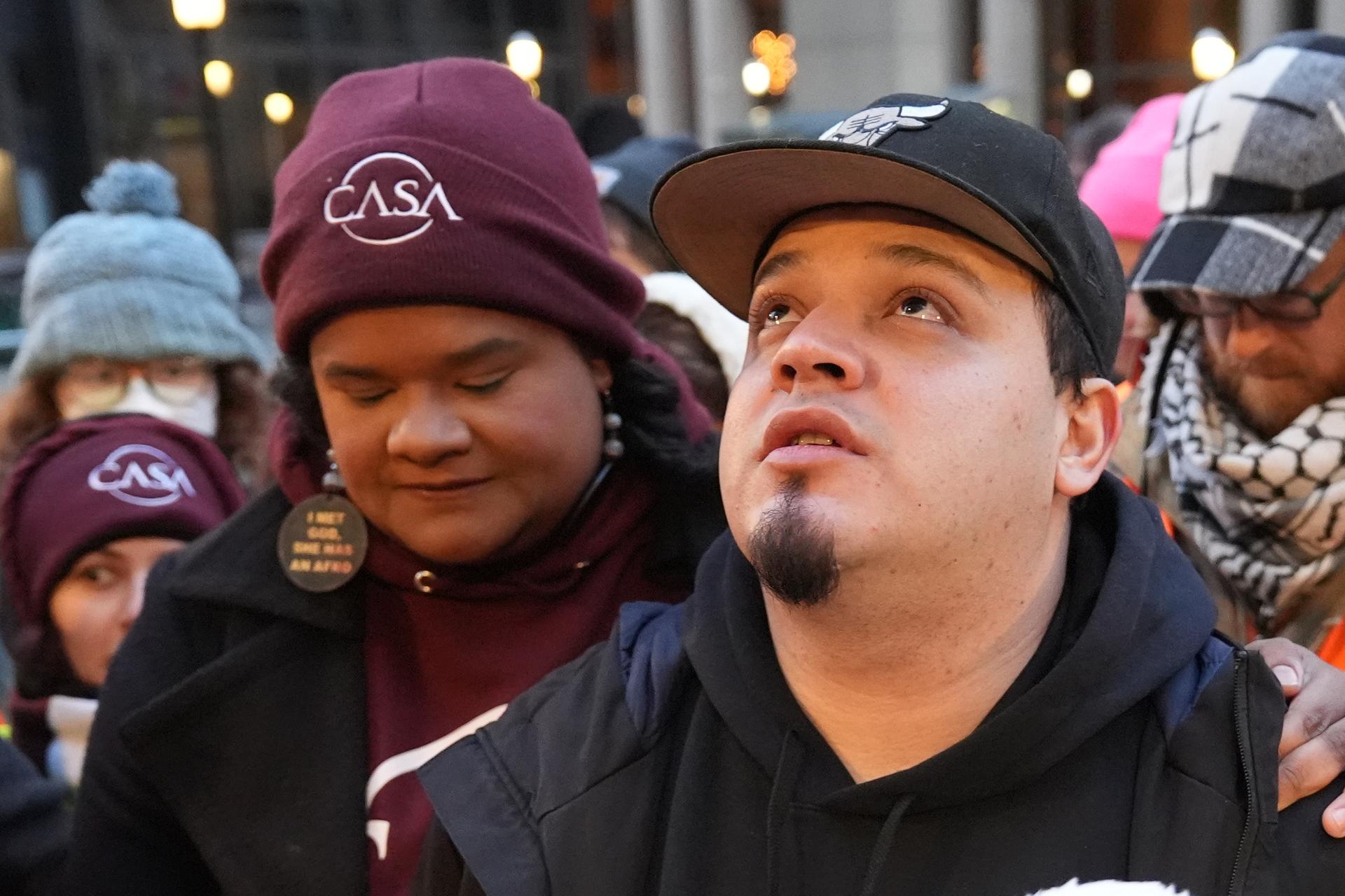 Kilmar Abrego Garcia waits with Lydia Walther-Rodriguez of Casa in Maryland, left, to enter the building for a mandatory check at the Immigration and Customs Enforcement office in Baltimore on Friday. (AP Photo/Stephanie Scarbrough).