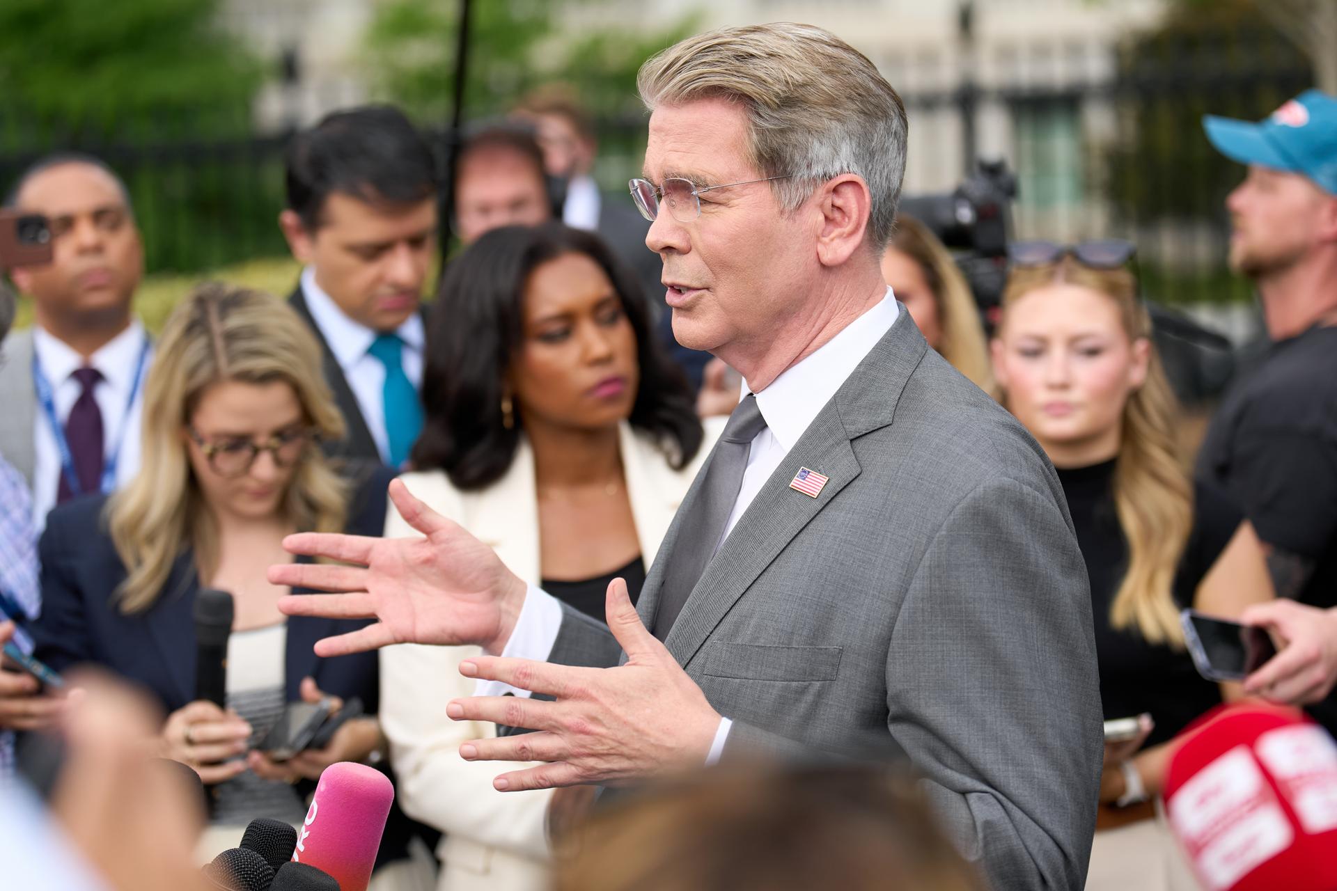Treasury Secretary Scott Bessent speaks to members of the media outside the White House in Washington, Thursday.