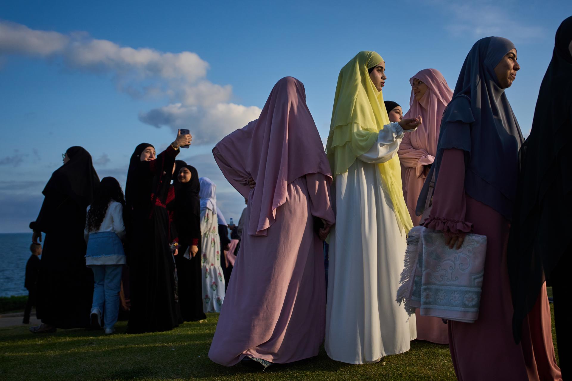 Muslim worshippers gather for the Eid al-Adha prayer in the mixed Arab-Jewish city of Jaffa, near Tel Aviv, Israel, Wednesday.
