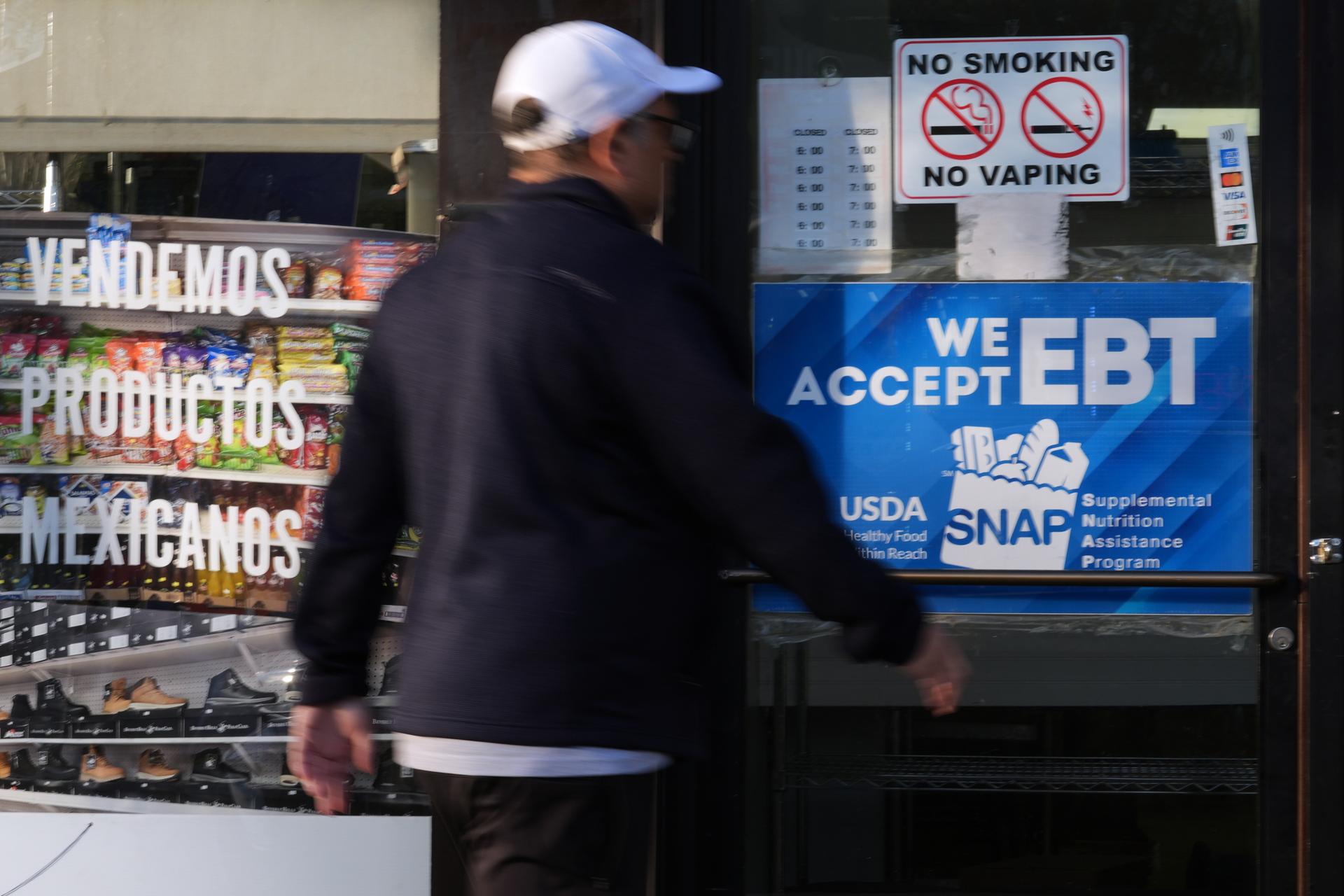 A customer walks into a bakery in Chicago on Sunday. (AP Photo/Nam Y. Huh)