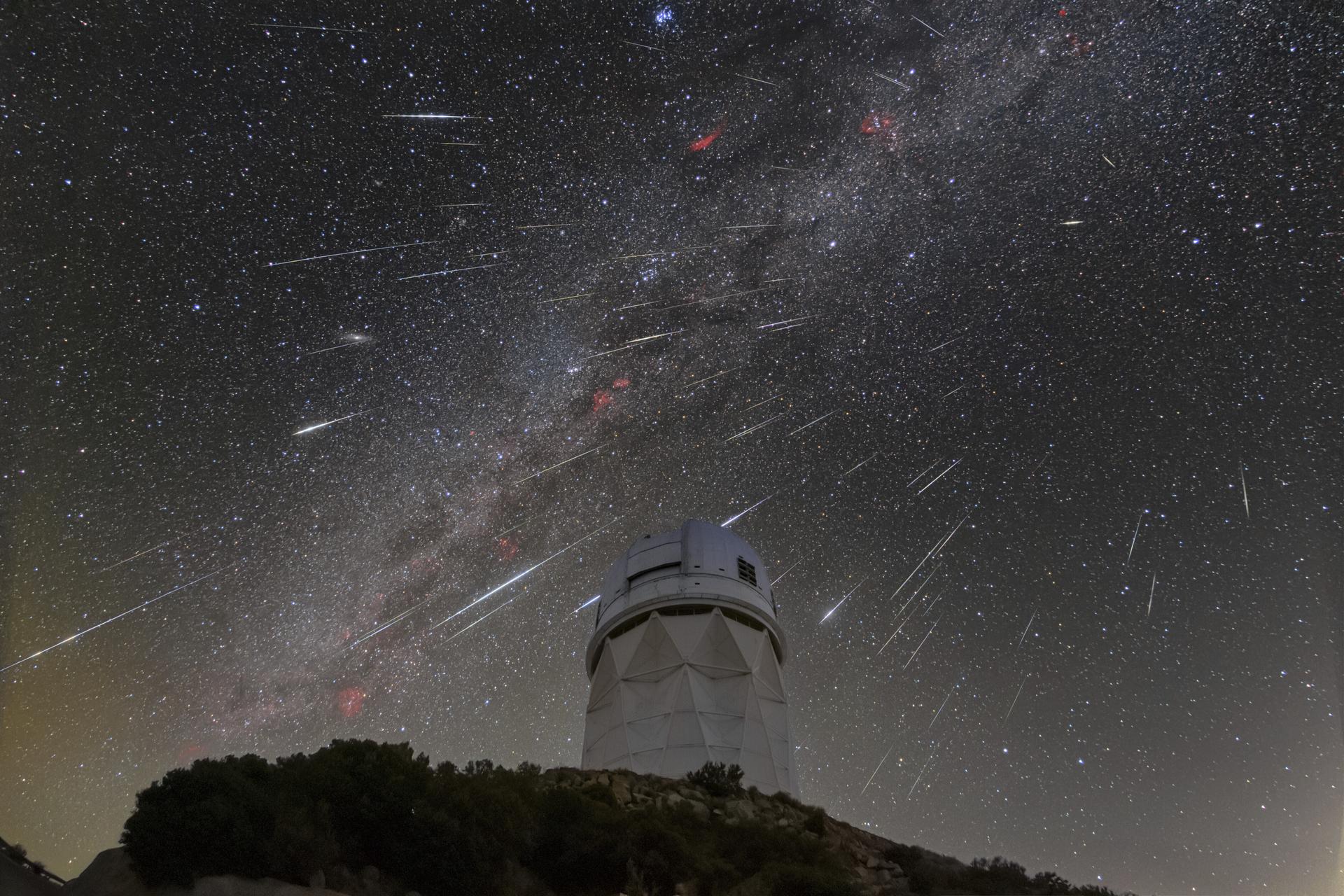  meteor shower streak across the sky above the Nicholas U. Mayall Telescope at Kitt Peak National Observatory, southwest of Tucson in the Tohono O'odham Nation, in 2023. 