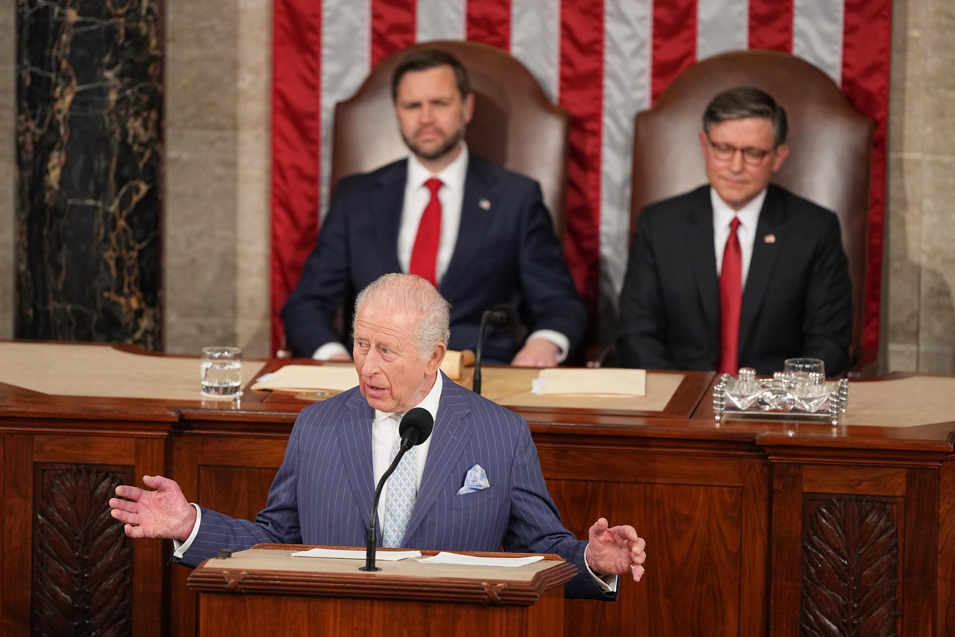 Britain's King Charles III speaks to a joint meeting of Congress in the House Chamber at the U.S. Capitol, Tuesday, in Washington, as Vice President JD Vance and House Speaker Mike Johnson listen.