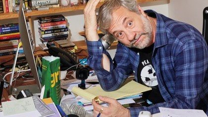 picture of Judd Apatow sitting at a desk