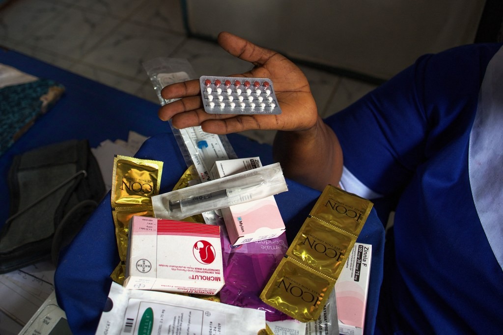 Various contraception methods including condoms and birth control pills.