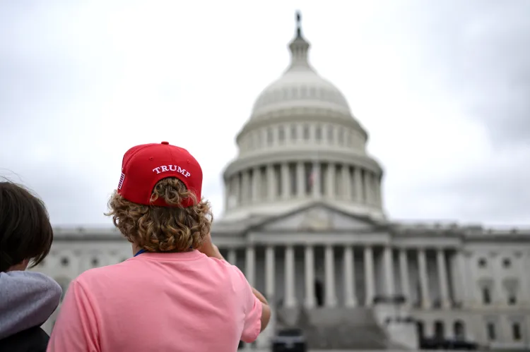 A person in a red hat that says 