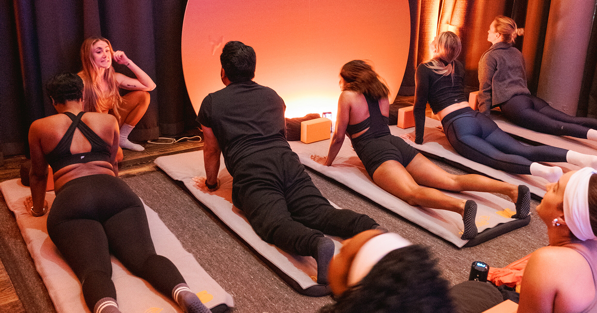 Guests participate in a restoration movement class 