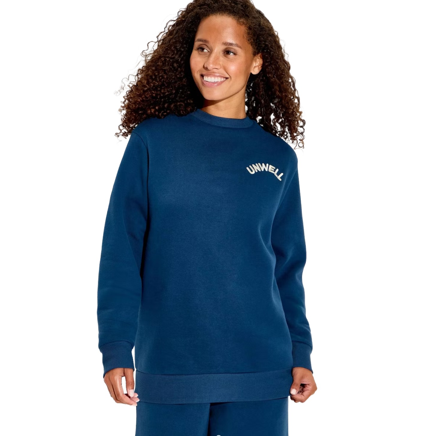 A model wearing a blue sweatshirt.