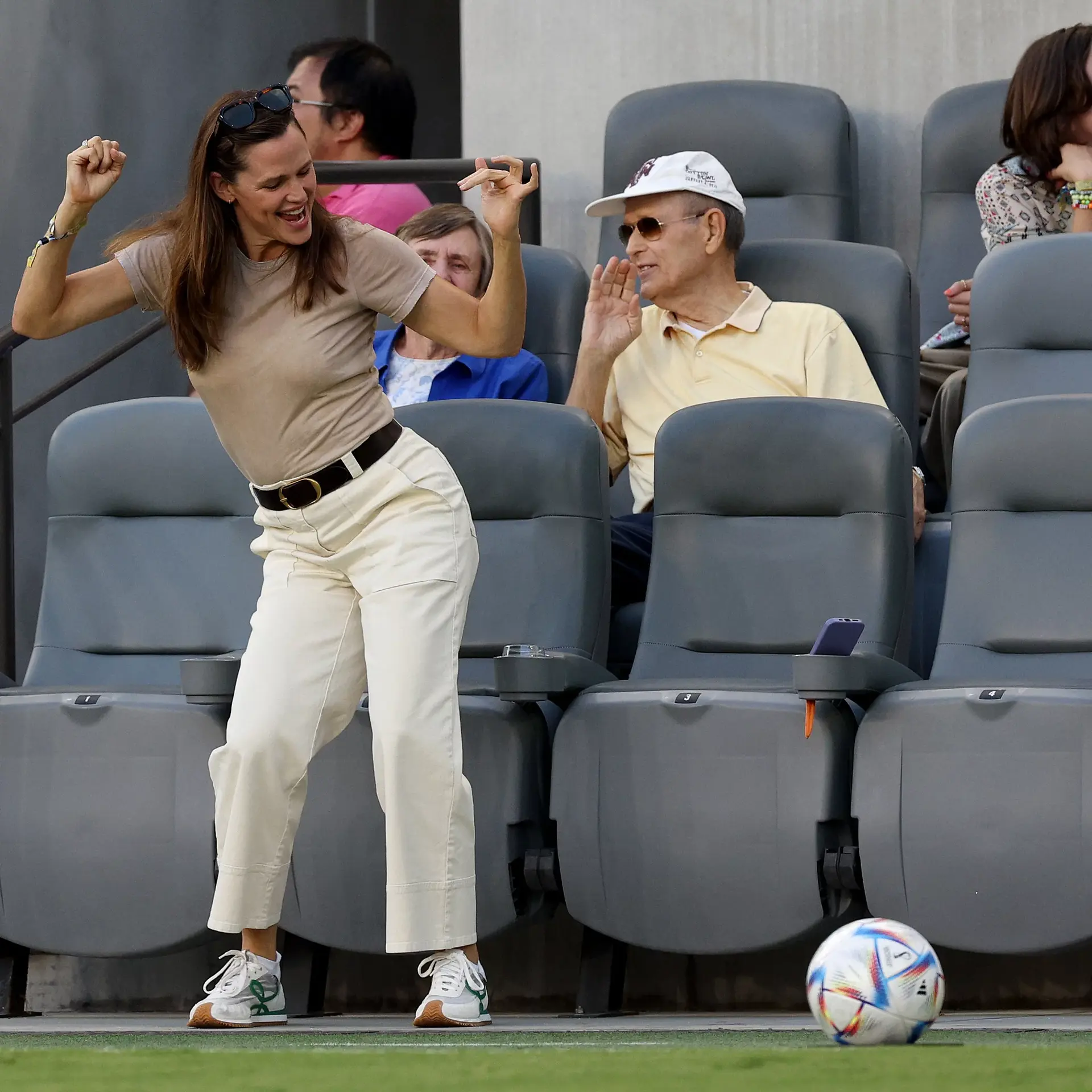 Jennifer Garner at a soccer game dancing.