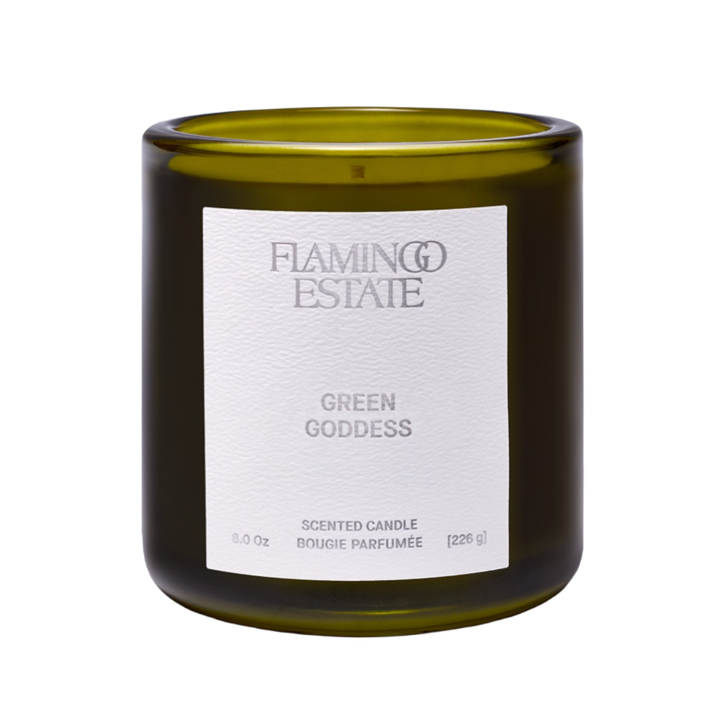 Green candle with a white label.