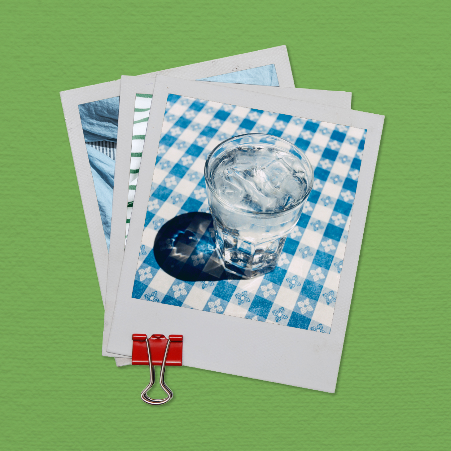 Polaroid photo of a glass of ice water