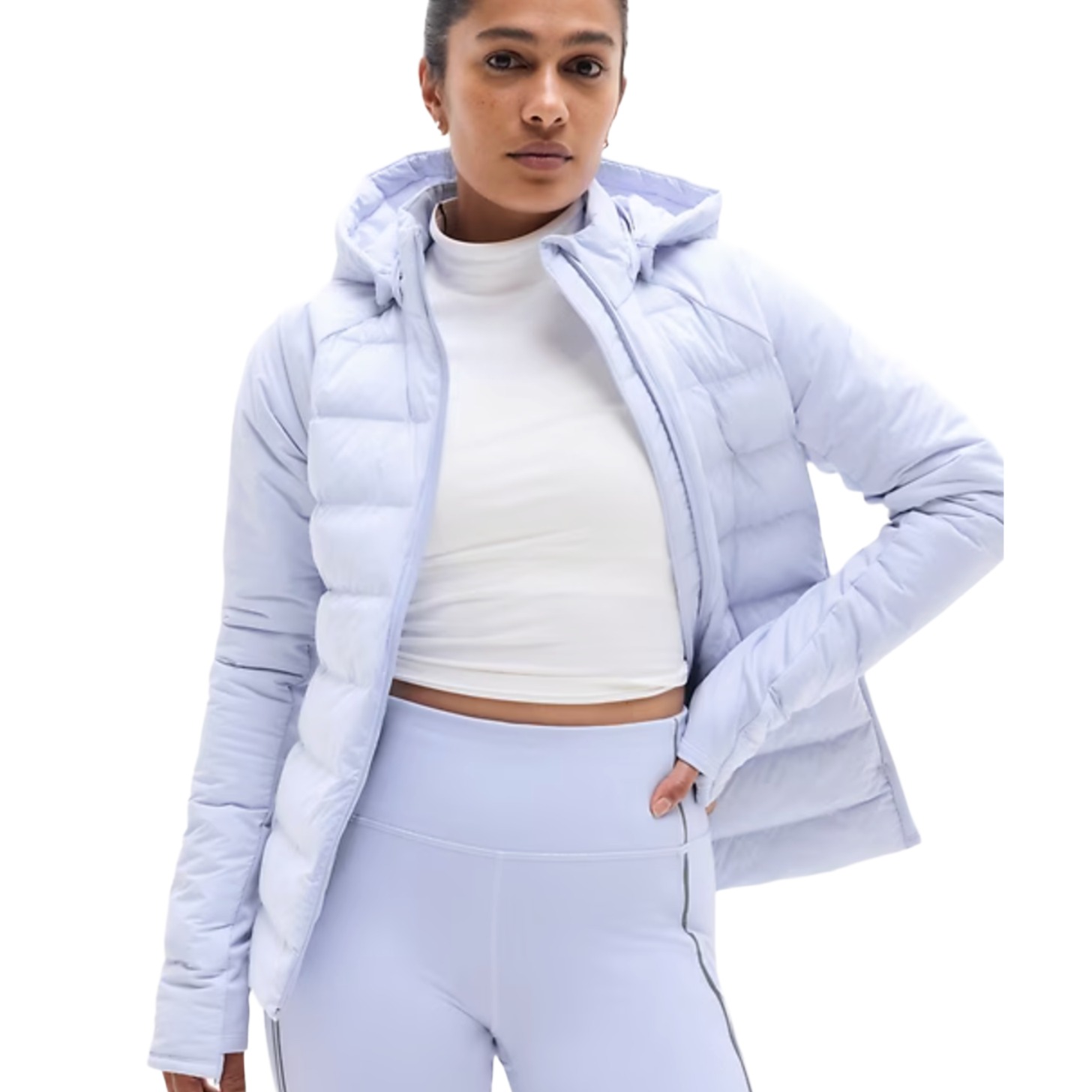 A model wearing a light purple puffer jacket.