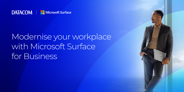 Datacom and Microsoft Surface banner promoting Microsoft Surface for Business, with a man holding a Surface laptop on a blue background.