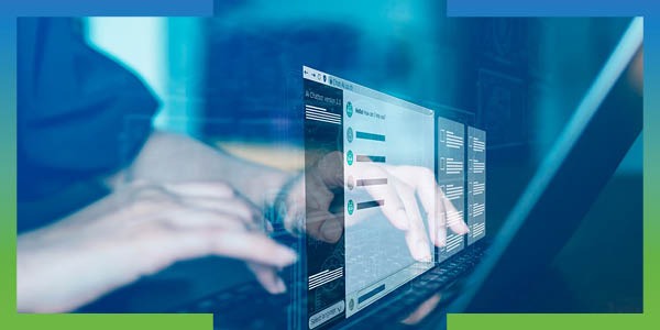 Hands type on a laptop beneath a translucent digital login interface, illustrating online account security, phishing risks, and cybersecurity threats.