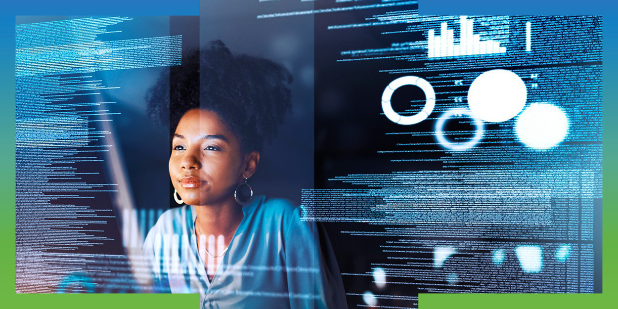 Woman reviewing software code and data analytics dashboards on glowing blue screens.