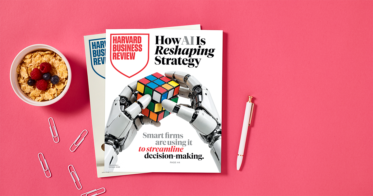 Harvard Business Review September/October 2026 issue, ‘How AI Is Reshaping Strategy,’ featuring robotic hands manipulating a Rubik’s Cube.