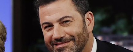 A close-up photo of a man's bearded face A close-up photo of a man's bearded face