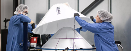 Workers assemble a space capsule at Varda Space Industries in El Segundo.