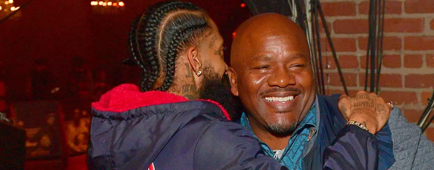 Nipsey Hussle, left, and Eugene “Big U” Henley in 2018. Henley has been accused of running a “mafia-like” enterprise.