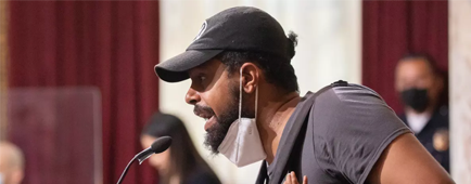  Jason Reedy speaks at a city council meeting