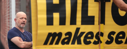 California gubernatorial candidate Steve Hilton stands near a campaign sign in West Hollywood on Tuesday.