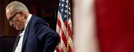 Senate Minority Leader Chuck Schumer attends a news conference about the government shutdown in September. Senate Minority Leader Chuck Schumer attends a news conference about the government shutdown in September.