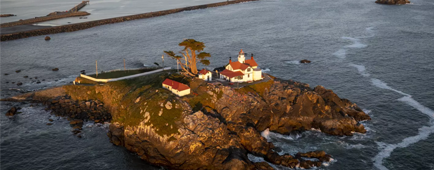 The Pacific Park Ferris wheel at the Santa Monica Pier is illuminated with red, white and blue. The Pacific Park Ferris wheel at the Santa Monica Pier is illuminated with red, white and blue.