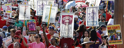 Teachers, union members, attend a rally at Molina Grand Park in Los Angeles. Teachers, union members, attend a rally at Molina Grand Park in Los Angeles.