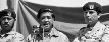 Cesar Chavez flanked by two Brown Berets, speaking at a Los Angeles peace rally Cesar Chavez flanked by two Brown Berets, speaking at a Los Angeles peace rally