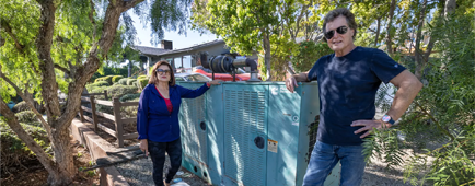 Joe Badame and Martha de la Torre in Rancho Palos Verdes, with their propane generator. Joe Badame and Martha de la Torre in Rancho Palos Verdes, with their propane generator.