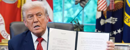 President Trump holds a signed presidential memorandum on countering &quot;domestic terrorism.&quot;