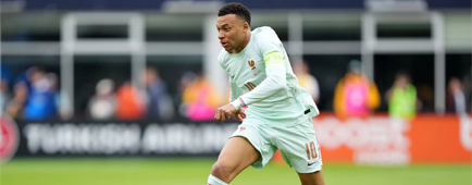 France's Kylian Mbappé controls the ball during a friendly match against Brazil in March.