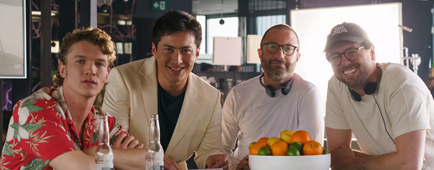 Connor Storrie, Hudson Williams, Jacob Tierney and Brendan Brady on the set of Heated Rivalry.