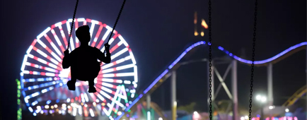 The Pacific Park Ferris wheel at the Santa Monica Pier is illuminated with red, white and blue. The Pacific Park Ferris wheel at the Santa Monica Pier is illuminated with red, white and blue.