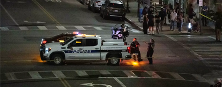 Police officers maintain a security perimeter