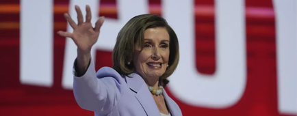 Rep. Nancy Pelosi waves Rep. Nancy Pelosi waves