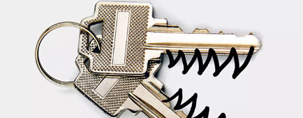 photo illustration of a pair of keys on a keyring, black marker predator teeth are drawn on the keys