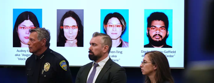Photos of suspects of a terror plot are shown on a screen Photos of suspects of a terror plot are shown on a screen
