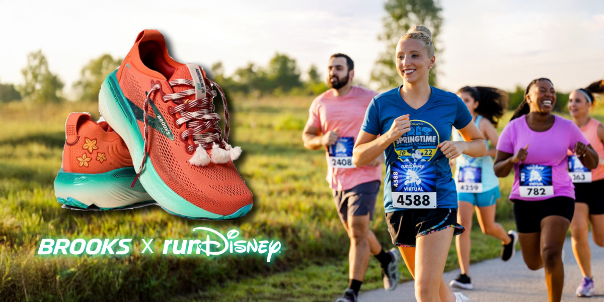 People running in a race, orante and teal moana themed shoes from the brooks x Run Disney Collection.